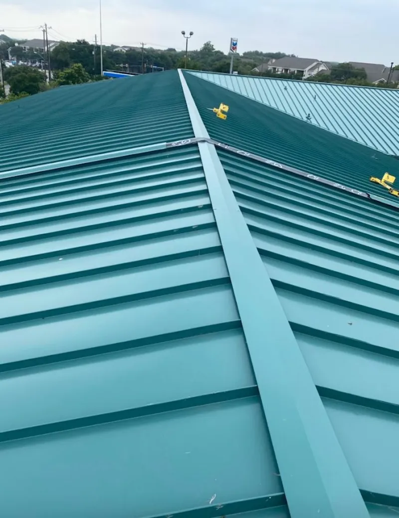 Green commercial metal roof ridge and valley for Metal Roof Repair in Farmington Hills