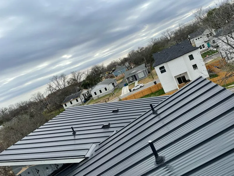 Standing seam metal roof panels with vents for Skylight Repair in Farmington Hills